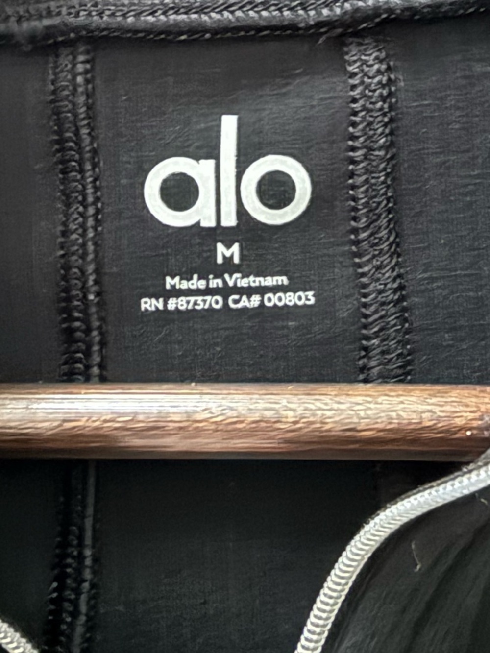 ALO Rise Up Black Long-Sleeve Quarter-Zip Bodysuit - Picture 4 of 5